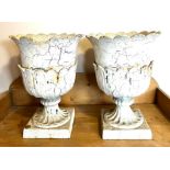 PAIR OF SMALL CAST IRON URNS WITH LOBE DECORATION, APPROX 41cm HIGH AND DIAMETER APPROX 29cm ONE