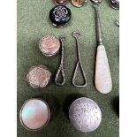 EIGHT BUTTON HOOKS, TWENTY-ONE LAPEL BUTTONS AND A SILVER FOB WATCH STAMPED 800