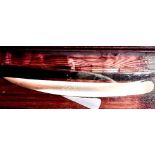 RACING YACHT, IN WOODEN CASE, HALF MODEL PROFILE, EARLY 20th CENTURY, APPROX 72cm LONG, 24.5cm
