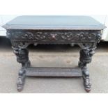 19th century heavily carved and ebonised oak single drawer console table by Rumney and Love. App.