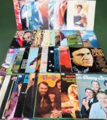 Parcel of vinyls including Frankie Vaughan, Glenn Campbell, Wham, Johnny Cash, Elvis, The Carpenters