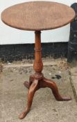 Small circular topped tripod side table. App. 68.5cm H x 47cm Diameter Reasonable used condition,