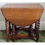 Oak barley twist gateleg table. App. 75cm H x 77cm W x 106cm D Reasonable used condition, scuffs and