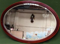 Mahogany bevelled and inlaid oval wall mirror. App. 57 x 82cm Reasonable used condition
