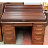 Late 19th/Early 20th century roll top desk, fitted with nine drawers. App. 117cm H x 126cm W x