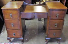 Art Deco oak seven drawer desk. Approx. 79cm H x 107.5cm W x 47cm D Reasonable used condition,