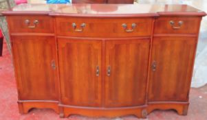 Strongbow 20th century yew wood breakfront sideboard. App. 86cm H x 138cm W x 44cm D Reasonable used
