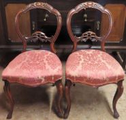 Pair of heavily carved 19th century piercework decorated cfrown back chairs, plus single inlaid