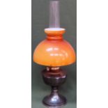 20th century Aladdin brass oil lamp with amber coloured glass shade. Approx. 62cm H Used