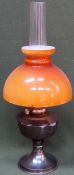 20th century Aladdin brass oil lamp with amber coloured glass shade. Approx. 62cm H Used