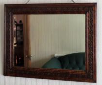 Early 20th century carved oak framed wall mirror. App. 56 x 71cm Reasonable used condition