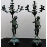 Pair of large and impressive figure form six sconce candleabras. App. 73cm H Both appear in