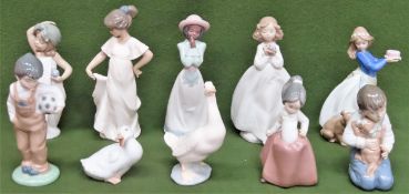 Nine various Nao glazed ceramic figures, plus one Lladro glazed ceramic figure Lladro figure has a
