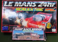 Boxed Scalextric Le Mans 24hr set, plus boxed Scalextric Hump back Bridge All in used condition,