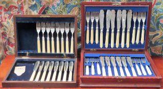Early 20th century cased part canteen of silver plated fish knives and forks, plus another part