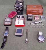 Sundry lot including boxed brownie, zippo lighters, watches, silver photo frame, police whistle