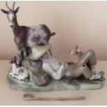 Large Lladro glazed ceramic figure group depicting animals and a young boy sleeping