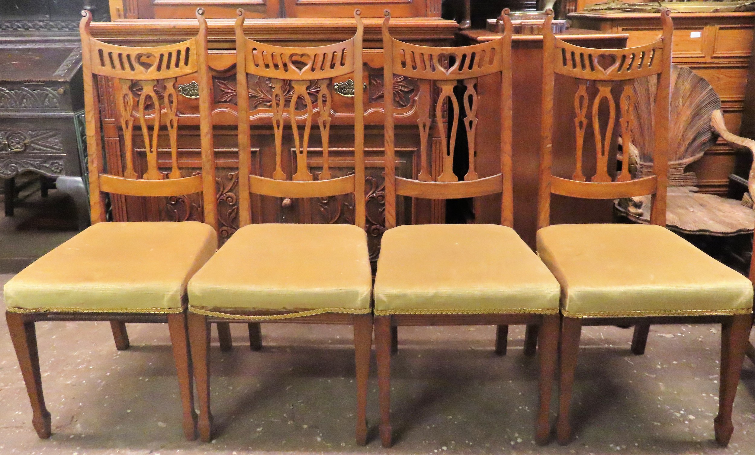 Set of Four early 20th century oak welsh style highback dining chairs