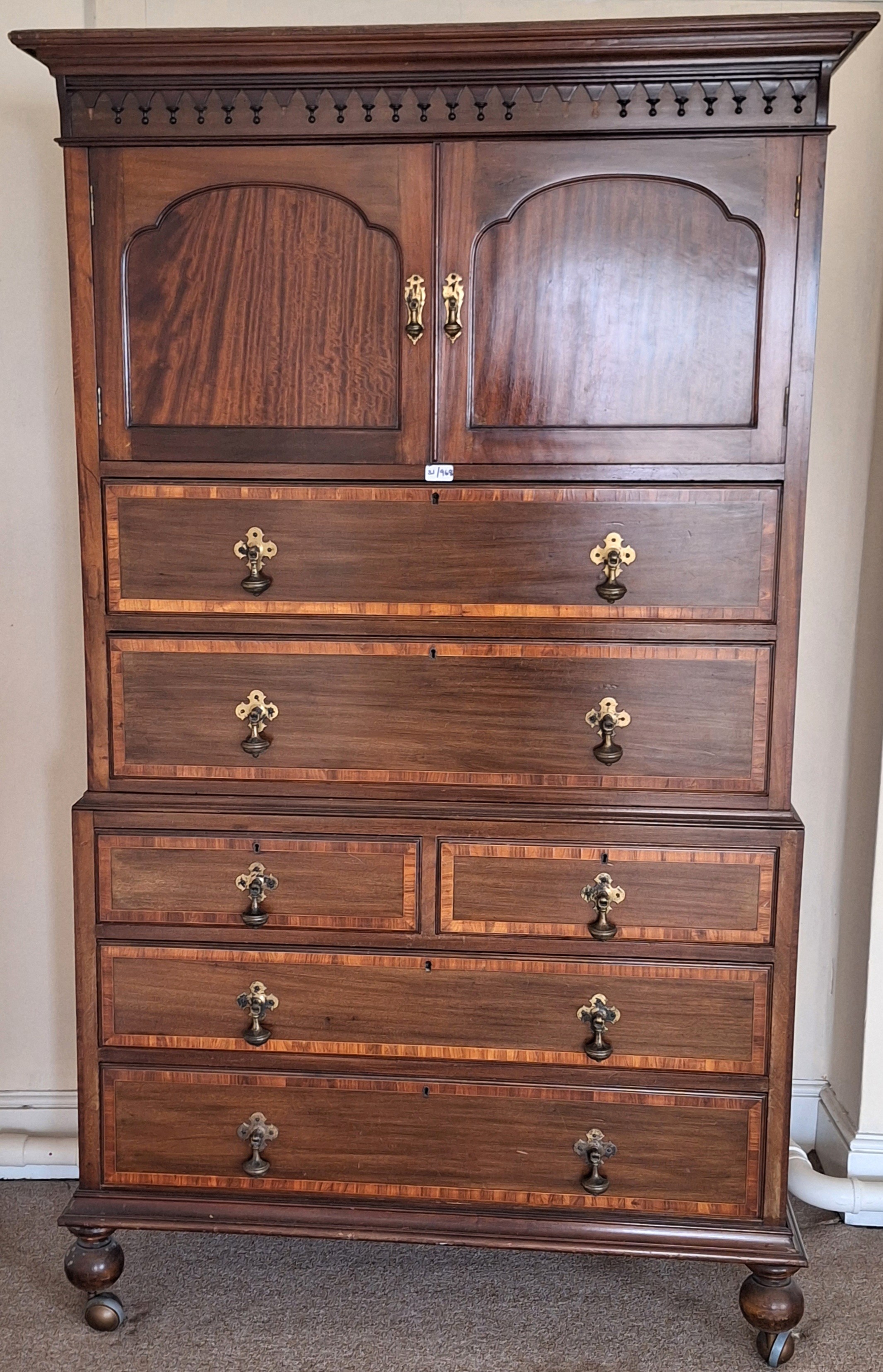 Mahogany inlaid six drawer sectional tallboy/linen press with cupboard doors to top