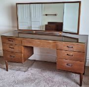 Wrighton mid 20th century teak seven drawer dressing table. App. 127cm H x 145cm W x 46cm D