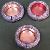 Three vintage Omani slave bracelets, converted into ashtrays