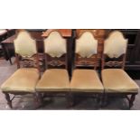 Set of Four early 20th century carved mahogany upholstered high back dining chairs