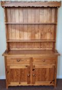 Pine kitchen dresser with plate rack, two drawers and two cupboard doors below