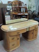 Art Deco style limed oak six drawer dressing table, with two cupboard doors
