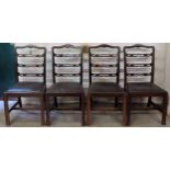 Set of four 19th century mahogany piercework decorated ladder back dining chairs