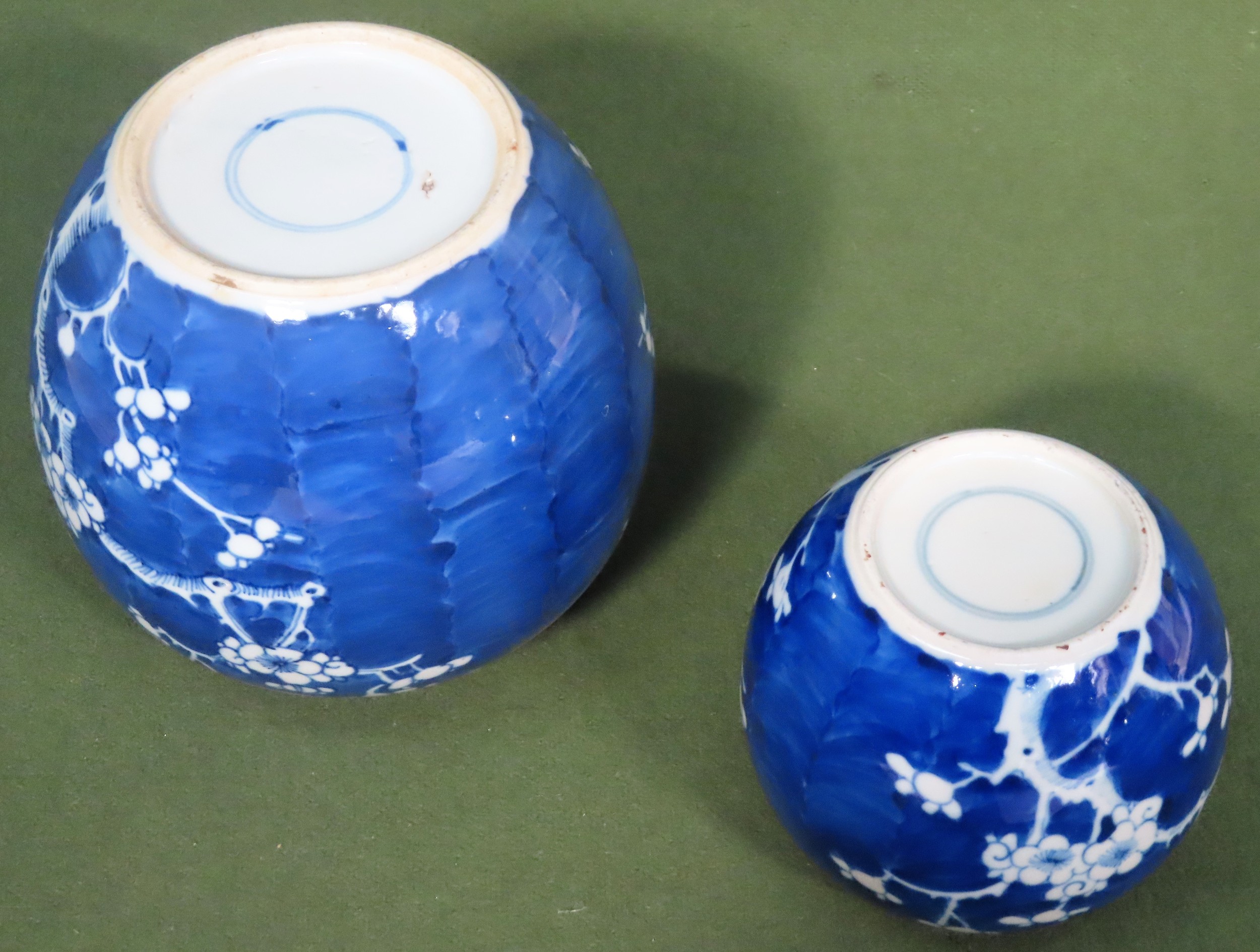 Two 19th century Oriental blue and white prunus pattern ginger jars. Larger app. 17cm H - Image 2 of 2