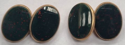 Pair of 9ct gold cufflinks, set with Cornelian type stones. Total weight 8.1g Both appear in