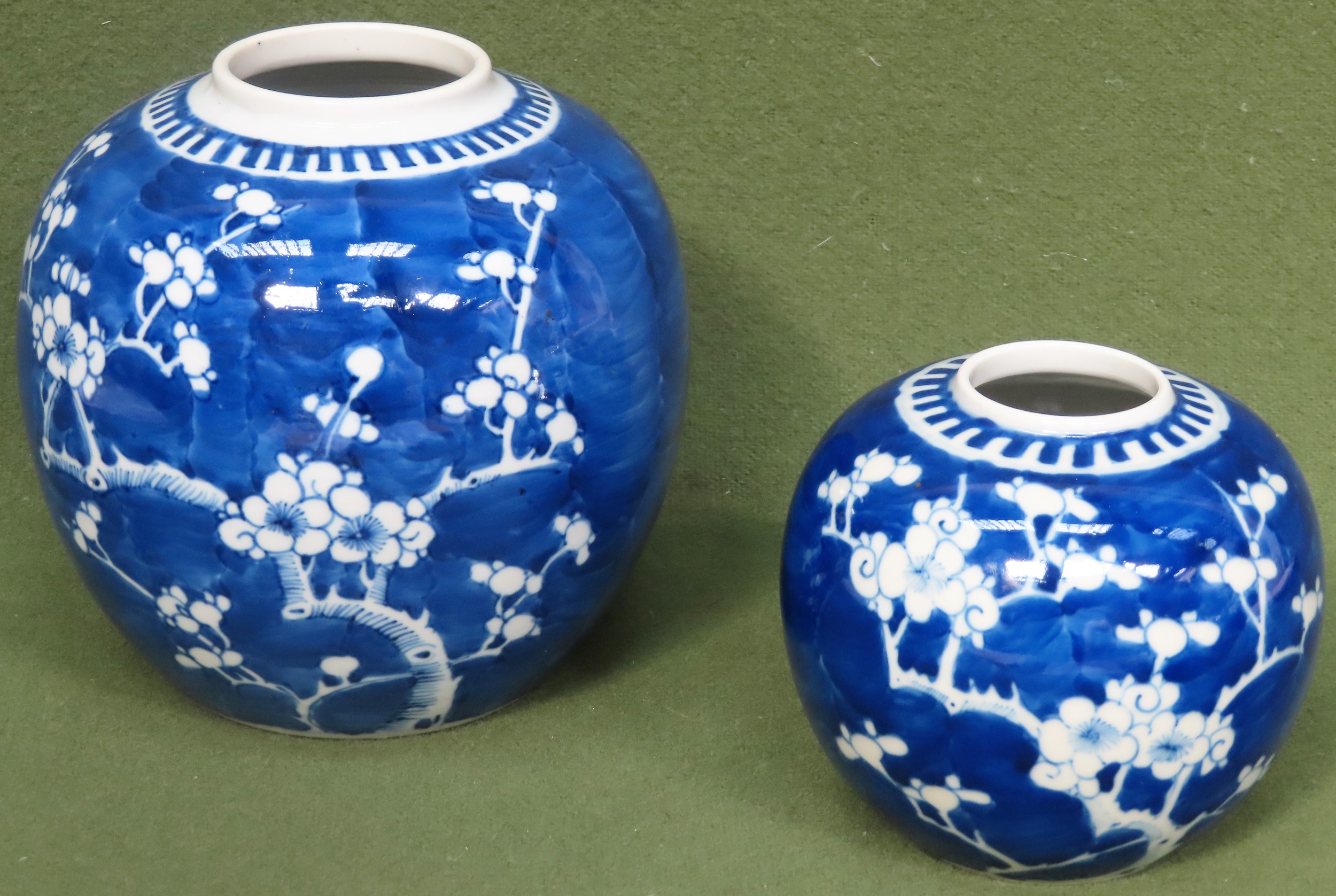 Two 19th century Oriental blue and white prunus pattern ginger jars. Larger app. 17cm H