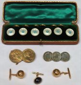 Mixed lot including cased buttons, gold coloured cufflinks, coin brooches etc All in used condition,