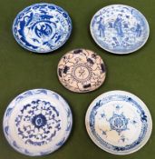 Five various antique Oriental style blue and white side plates