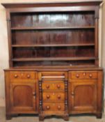 19th century Oak breakfront Welsh dresser with plate rack and five drawers and two cupboard doors