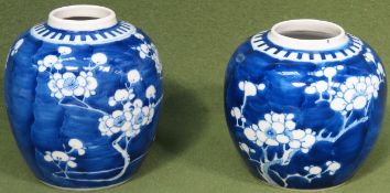 Two 19th century Oriental blue and white prunus pattern ginger jars. Larger app. 15cm H