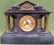 Vintage black slate mantle clock with gilt metal columns and brass dial, by Richardson, Paris.