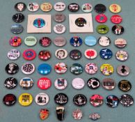 Various badges including The Veils, Nirvana, Coldplay etc