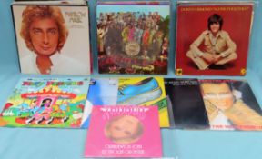 Approximately 30+ vinyls including The Beatles, Olivia Newton John, Adam and the Ants, Donny Osmond,