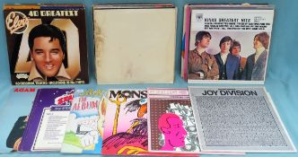 Approximately 30+ vinyls including The Kinks, The Beatles, Azteca Camera, Elvis Presley, Adam and