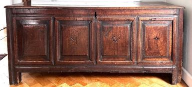 OAK COFFER UPON STILE FEET, PLANK TOP, CANDLE BOX INTERIOR