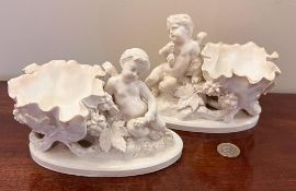 PAIR OF MOORES CHERUB POSY BOWLS, APPROX 11cm HIGH AND 15cm WIDE