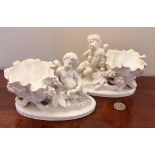 PAIR OF MOORES CHERUB POSY BOWLS, APPROX 11cm HIGH AND 15cm WIDE