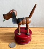 ARTICULATED TRIANG TOY DEPICTING WALT DISNEY'S PLUTO, CIRCA 1930s, APPROX 12cm HIGH