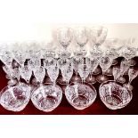 APPROX. THIRTY-SEVEN FINELY CUT DRINKING GLASSES AND FINGER BOWLS, MAKER UNKNOWN