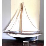 HAND BUILT MODEL OF POND YACHT WITH WALL MOUNTED BRACKET, CIRCA 2005, HULL LENGTH APPROX 104cm