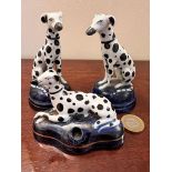 THREE PORCELAIN DALMATIAN FIGURES, APPROX 10cm HIGH