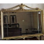 20th century gilt framed and bevelled wall mirror. App. 51 x 87cm