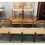 G Plan mid 20th century teak extending dining table with one leaf, plus eight chairs