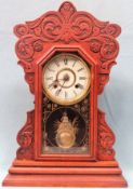 New Haven Clock Co. carved Oak cased American mantle clock. App. 55cm H